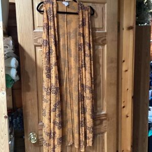 LuLaRoe Joy vest from the Elegant Collection- sparkly!
